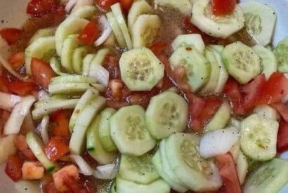 Thumbnail for Cucumber Onion and Tomato Salad Recipe