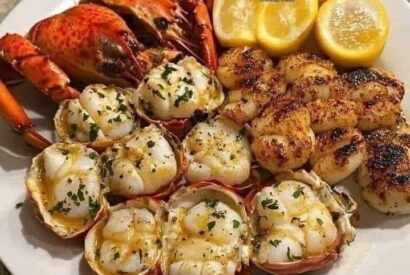 Thumbnail for Garlic Butter Lobster and Scallops with Lemon Orzo Recipe