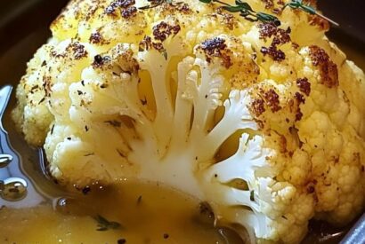 Thumbnail for Whole Roasted Cauliflower with Butter Sauce